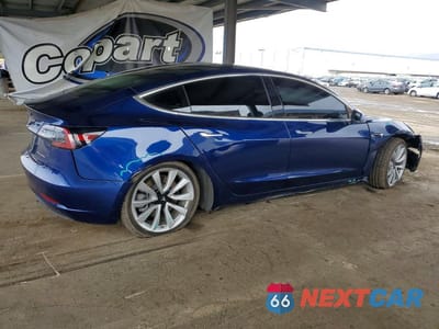 Trzecie zdjęcie samochodu z tyłu: 2018 TESLA MODEL 3 VIN:5YJ3E1EB5JF115985 - miniatura
