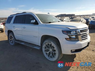 Czwarte zdjęcie samochodu z boku: 2015 CHEVROLET TAHOE K1500 LT VIN:1GNSKBKC4FR581990 - miniatura