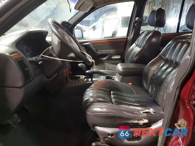 Zdjęcie 7 z 13 samochodu: 1999 JEEP GRAND CHEROKEE LIMITED VIN:1J4GW68N3XC632994 - miniatura