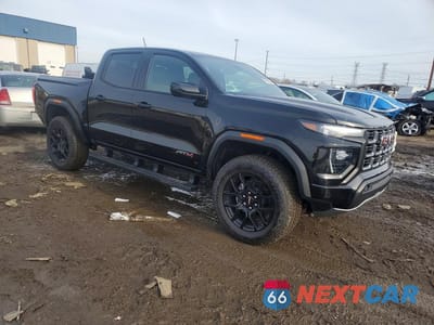 Czwarte zdjęcie samochodu z boku: 2025 GMC CANYON AT4 VIN:1GTP2DEK2S1242957 - miniatura