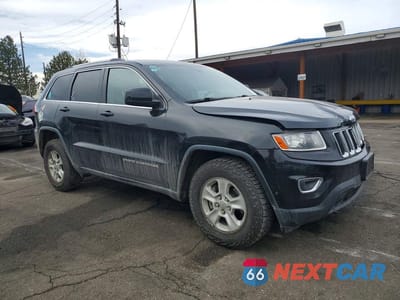 Czwarte zdjęcie samochodu z boku: 2014 JEEP GRAND CHEROKEE LAREDO VIN:1C4RJFAG2EC534495 - miniatura