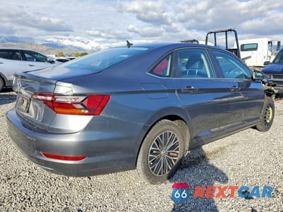 Trzecie zdjęcie samochodu z tyłu: 2019 VOLKSWAGEN JETTA S VIN:3VWC57BU7KM106210 - miniatura