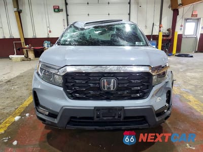 Piąte zdjęcie samochodu w środku: 2024 HONDA PASSPORT EXL VIN:5FNYF8H58RB023802 - miniatura