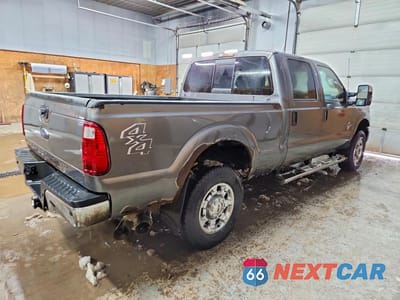 Trzecie zdjęcie samochodu z tyłu: 2014 FORD F250 SUPER DUTY VIN:1FT7W2BT0EEA14149 - miniatura