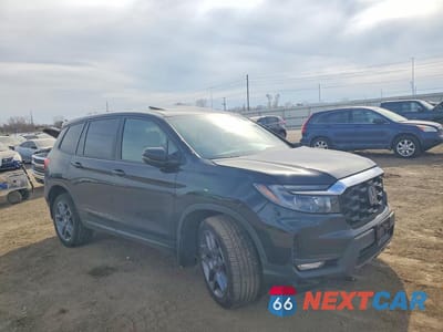 Czwarte zdjęcie samochodu z boku: 2023 HONDA PASSPORT EXL VIN:5FNYF8H51PB011830 - miniatura