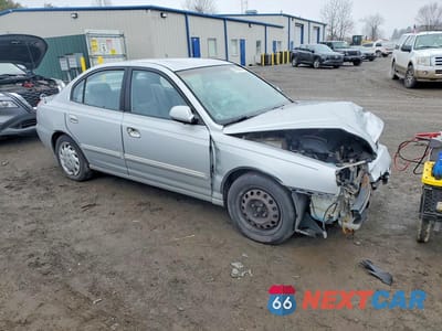 Czwarte zdjęcie samochodu z boku: 2004 HYUNDAI ELANTRA GLS VIN:KMHDN46D24U741118 - miniatura