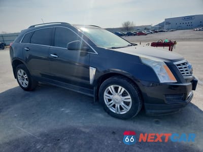 Czwarte zdjęcie samochodu z boku: 2015 CADILLAC SRX VIN:3GYFNAE33FS619840 - miniatura