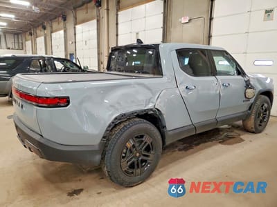 Trzecie zdjęcie samochodu z tyłu: 2025 RIVIAN R1T ADVENTURE VIN:7FCTGBAAXSN040324 - miniatura