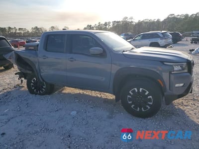 Czwarte zdjęcie samochodu z boku: 2022 NISSAN FRONTIER PRO-X VIN:1N6ED1EJ2NN632989 - miniatura