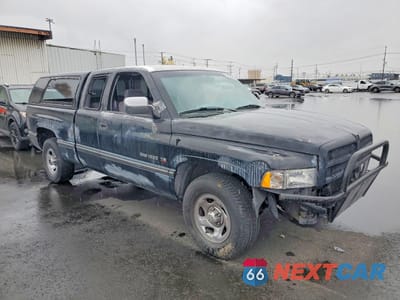 Czwarte zdjęcie samochodu z boku: 1997 DODGE RAM 1500 VIN:3B7HC13Z8VG833736 - miniatura