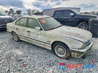 Czwarte zdjęcie samochodu z boku: 1995 BMW 5 SERIES VIN:WBAHD632XSGK46424 - miniatura