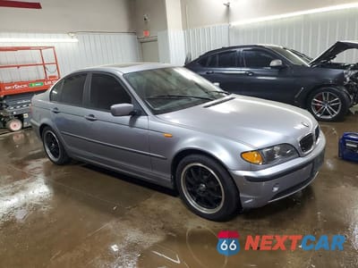 Czwarte zdjęcie samochodu z boku: 2003 BMW 325 I VIN:WBAET37423NJ38196 - miniatura