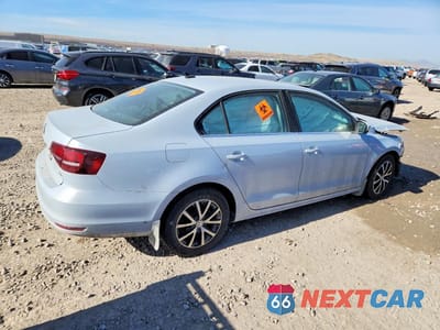 Trzecie zdjęcie samochodu z tyłu: 2018 VOLKSWAGEN JETTA SE VIN:3VWDB7AJ2JM236074 - miniatura