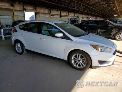 Czwarte zdjęcie samochodu z boku: 2017 FORD FOCUS SE VIN:1FADP3K24HL247955 - miniatura
