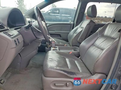 Zdjęcie 7 z 13 samochodu: 2010 HONDA ODYSSEY EXL VIN:5FNRL3H65AB094579 - miniatura