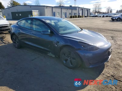 Czwarte zdjęcie samochodu z boku: 2023 TESLA MODEL 3 VIN:5YJ3E1EA9PF679672 - miniatura