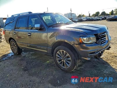 Czwarte zdjęcie samochodu z boku: 2015 LINCOLN NAVIGATOR VIN:5LMJJ2HT8FEJ01738 - miniatura