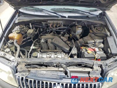 Zdjęcie 12 z 13 samochodu: 2006 MERCURY MARINER VIN:4M2YU57126KJ17718 - miniatura