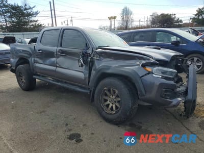 Czwarte zdjęcie samochodu z boku: 2020 TOYOTA TACOMA TRD PRO VIN:5TFCZ5AN0LX231535 - miniatura
