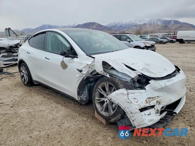 Czwarte zdjęcie samochodu z boku: 2023 TESLA MODEL Y VIN:7SAYGAEE1PF798600 - miniatura