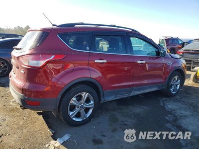 Trzecie zdjęcie samochodu z tyłu: 2016 FORD ESCAPE SE VIN:1FMCU9G97GUC23385 - miniatura