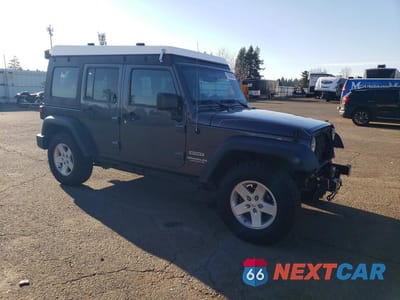 Czwarte zdjęcie samochodu z boku: 2016 JEEP WRANGLER UNLIMITED SPORT VIN:1C4BJWDG1GL167623 - miniatura