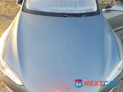 Zdjęcie 11 z 12 samochodu: 2013 TESLA MODEL S VIN:5YJSA1CN1DFP05500 - miniatura
