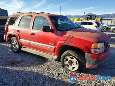 Czwarte zdjęcie samochodu z boku: 2001 GMC YUKON K1500 VIN:1GKEC13T61J192744 - miniatura