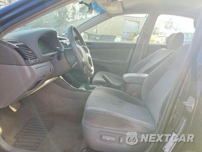 Zdjęcie 7 z 11 samochodu: 2004 TOYOTA CAMRY LE VIN:JTDBE32K140272444 - miniatura