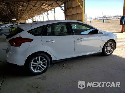 Trzecie zdjęcie samochodu z tyłu: 2017 FORD FOCUS SE VIN:1FADP3K24HL247955 - miniatura