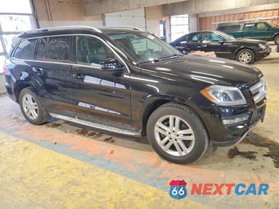Czwarte zdjęcie samochodu z boku: 2014 MERCEDES-BENZ GL 450 4MATIC VIN:4JGDF7CE6EA418799 - miniatura