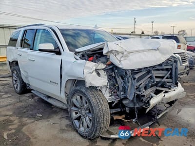 Czwarte zdjęcie samochodu z boku: 2019 CHEVROLET TAHOE K1500 LT VIN:1GNSKBKC6KR133647 - miniatura