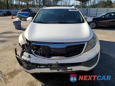 Piąte zdjęcie samochodu w środku: 2013 KIA SPORTAGE LX VIN:KNDPB3A21D7429736 - miniatura