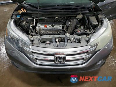 Zdjęcie 12 z 13 samochodu: 2012 HONDA CR-V LX VIN:2HKRM4H37CH620787 - miniatura