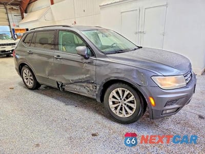 Czwarte zdjęcie samochodu z boku: 2018 VOLKSWAGEN TIGUAN S VIN:3VV0B7AX9JM009696 - miniatura
