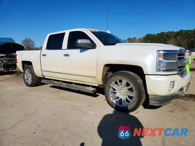 Czwarte zdjęcie samochodu z boku: 2018 CHEVROLET SILVERADO K1500 HIGH COUNTRY VIN:3GCUKTEC9JG593743 - miniatura