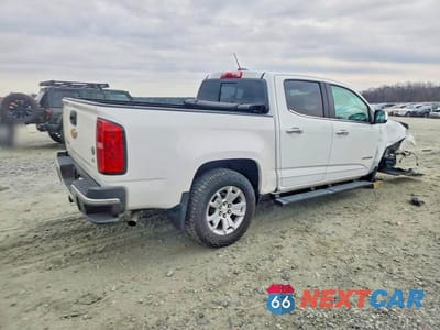 Trzecie zdjęcie samochodu z tyłu: 2018 CHEVROLET COLORADO LT VIN:1GCGSCEN5J1197452 - miniatura