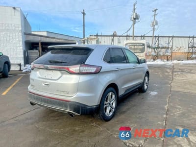 Czwarte zdjęcie samochodu z boku: 2018 FORD EDGE TITANIUM VIN:2FMPK4K99JBB42550 - miniatura