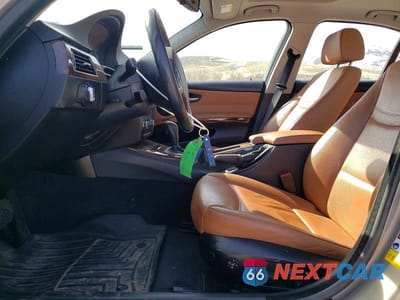 Zdjęcie 7 z 12 samochodu: 2009 BMW 328 XI VIN:WBAPK735X9A450770 - miniatura
