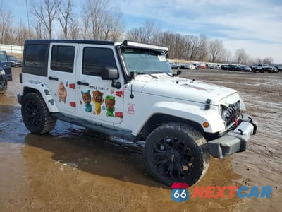 Czwarte zdjęcie samochodu z boku: 2014 JEEP WRANGLER UNLIMITED SAHARA VIN:1C4HJWEGXEL262428 - miniatura