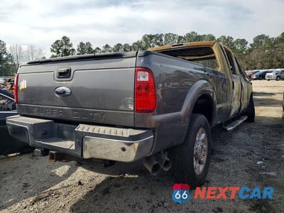 Czwarte zdjęcie samochodu z boku: 2014 FORD F350 SUPER DUTY VIN:1FT8W3BT7EEA64749 - miniatura