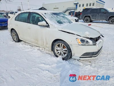 Czwarte zdjęcie samochodu z boku: 2015 VOLKSWAGEN JETTA BASE VIN:3VW2K7AJ1FM419674 - miniatura