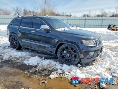 Czwarte zdjęcie samochodu z boku: 2012 JEEP GRAND CHEROKEE OVERLAND VIN:1C4RJFCT9CC297642 - miniatura