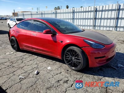 Czwarte zdjęcie samochodu z boku: 2022 TESLA MODEL 3 VIN:5YJ3E1EB7NF286369 - miniatura