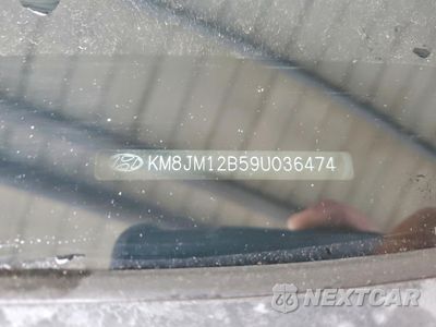 Zdjęcie 12 z 12 samochodu: 2009 HYUNDAI TUCSON GLS VIN:KM8JM12B59U036474 - miniatura