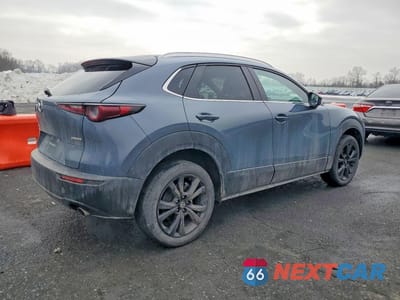 Trzecie zdjęcie samochodu z tyłu: 2022 MAZDA CX-30 PREFERRED VIN:3MVDMBCL4NM408060 - miniatura