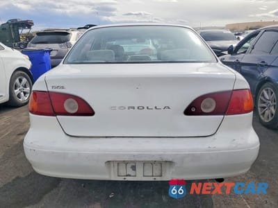 Zdjęcie 6 z 12 samochodu: 2001 TOYOTA COROLLA CE VIN:1NXBR12E51Z462945 - miniatura