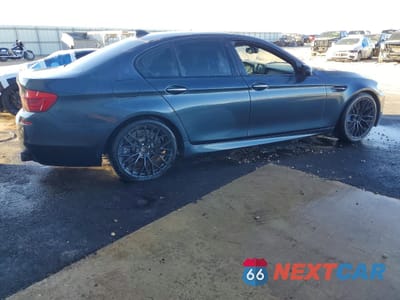 Trzecie zdjęcie samochodu z tyłu: 2013 BMW M5 VIN:WBSFV9C56DC773799 - miniatura