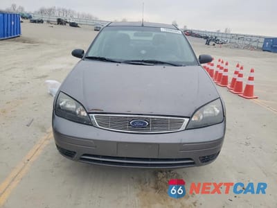 Piąte zdjęcie samochodu w środku: 2007 FORD FOCUS VIN:1FAFP34N37W101060 - miniatura