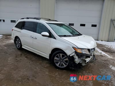 Czwarte zdjęcie samochodu z boku: 2016 HONDA ODYSSEY TOURING VIN:5FNRL5H97GB025553 - miniatura